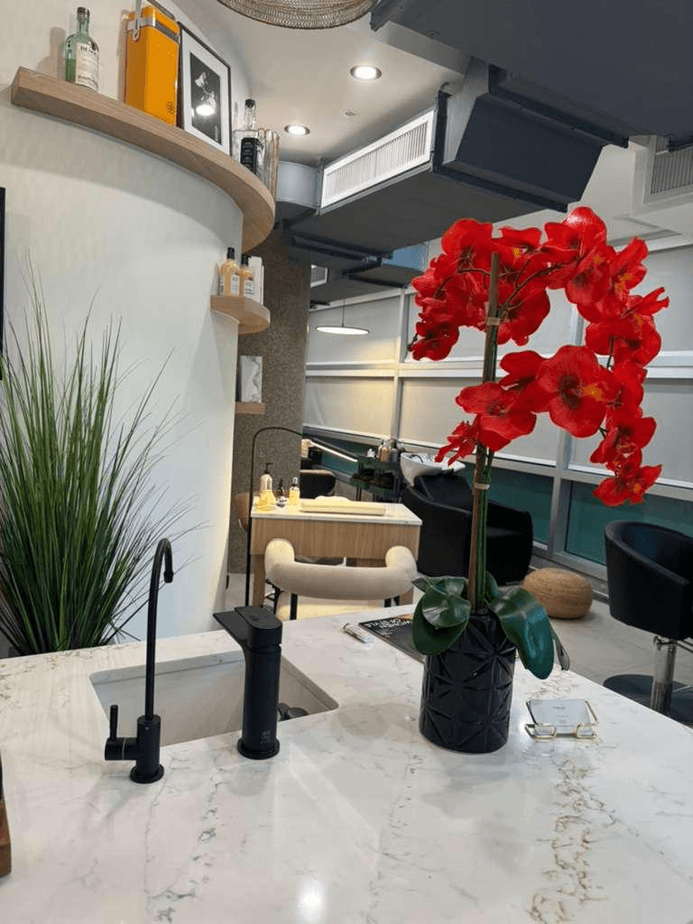 Salon styling floor with marble vanity and service stations